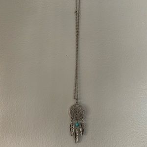 Metal dream catcher necklace with turquoise